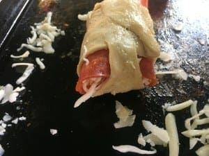 edge of a closed pepperoni roll