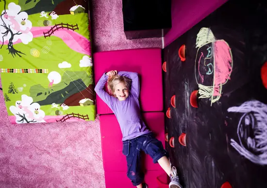 colorful kids room with a blackboard