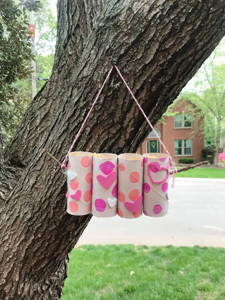 make a bird feeder out of a toilet paper roll