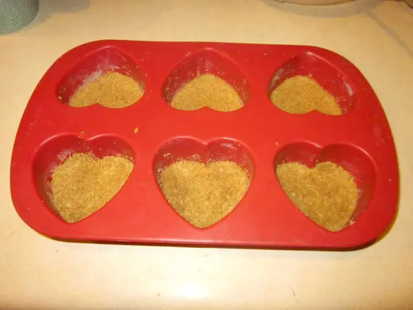 baking mold with crust pressed in 