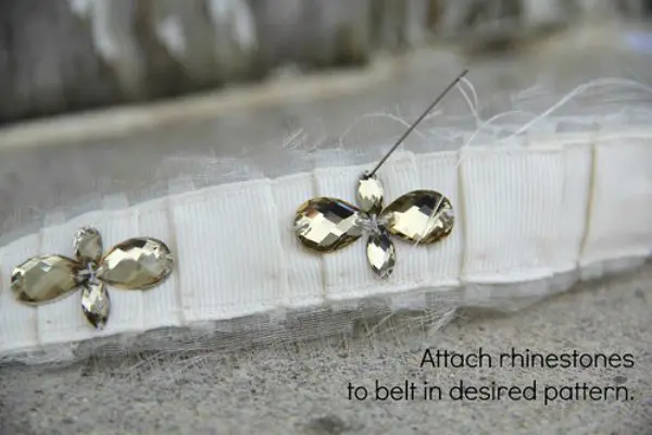 attach rhinestones to belt