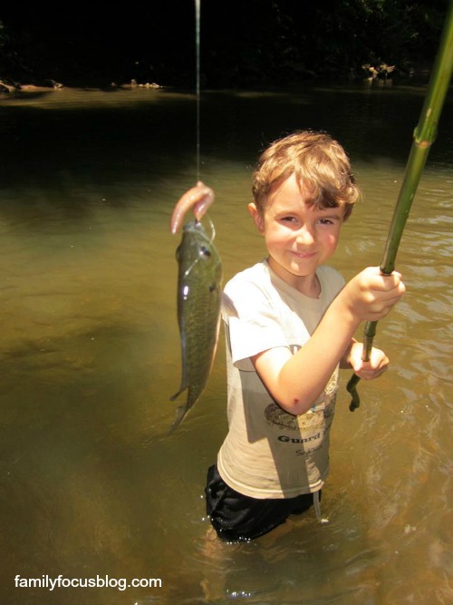 children enjoy nature- kid fishing