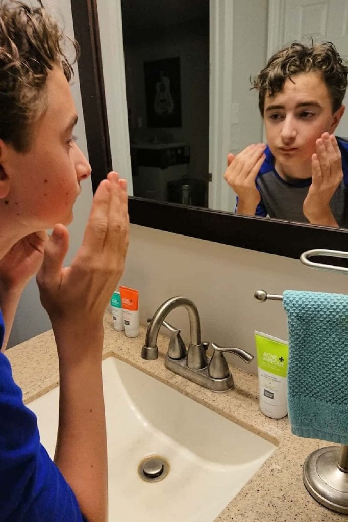 does acne wipeout work- washing his face with Clear Pore Oil Free Cleanser